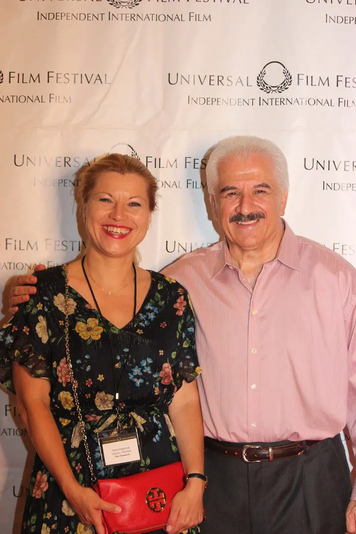 A man and woman posing for the camera.