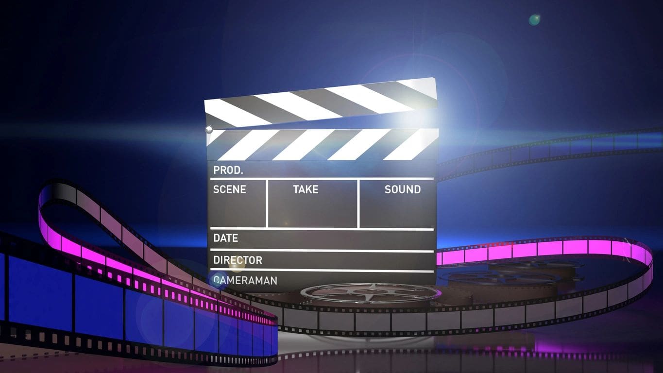 A large screen with a movie clapper board on it.